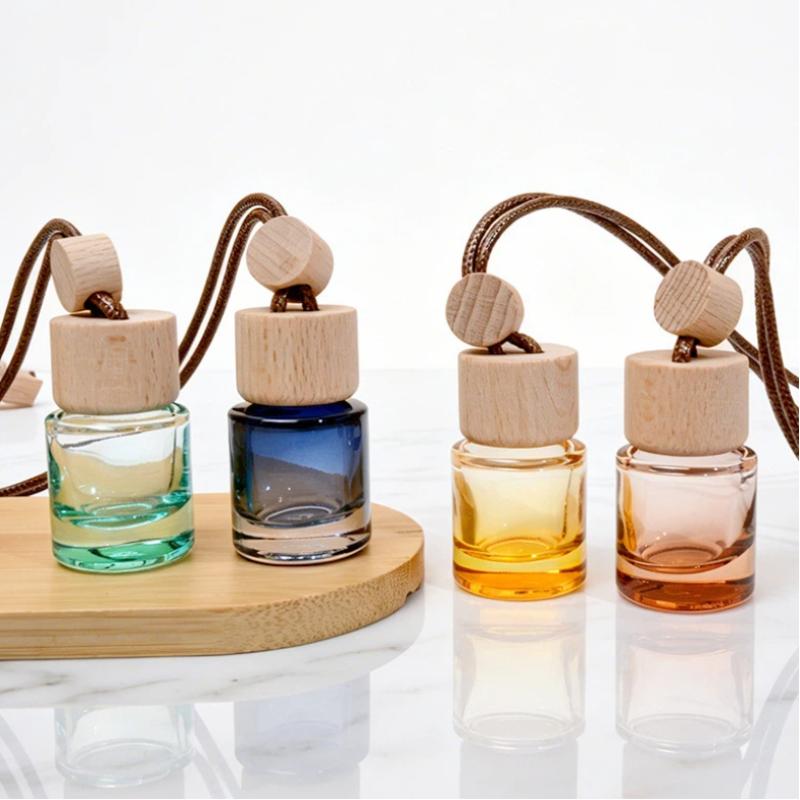 Car Air Freshener - ขวดน้ำมันหอมระเหยแบบจี้กลมขนาดเล็ก สำหรับปรับอากาศในรถยนต์ น้ำหอมตกแต่ง